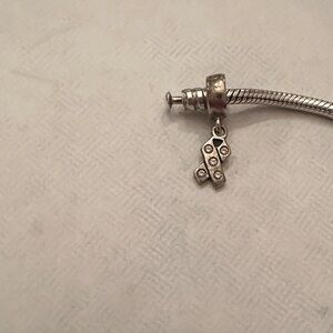 Silver Ribbon Charm